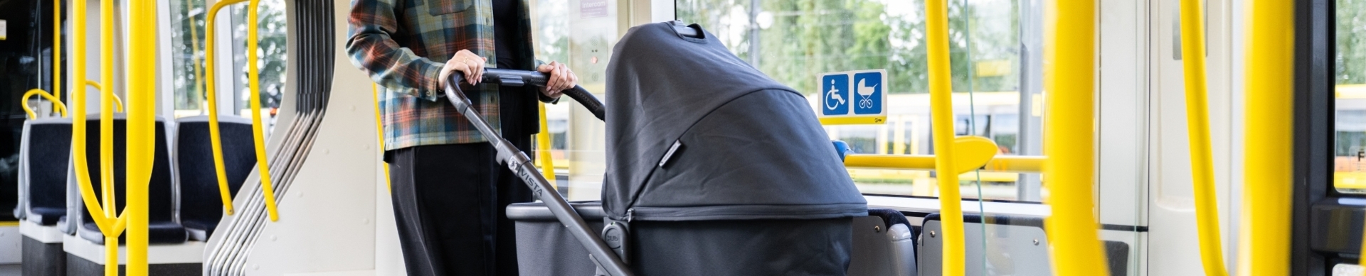Woman with stroller on bus